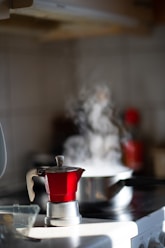 red and white ceramic mug