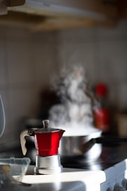 red and white ceramic mug