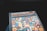 A book cover titled 'Draplin Design Co. Pretty Much Everything' by Aaron James Draplin. The cover features various colorful icons and symbols arranged in a grid pattern below the title.