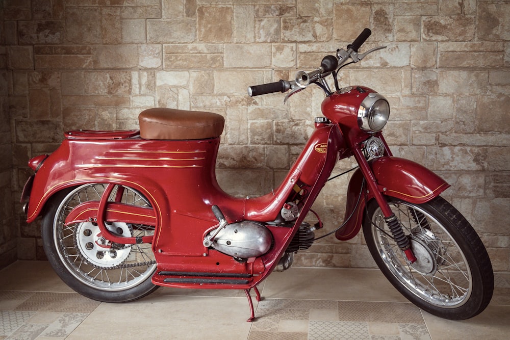 red and black motor scooter