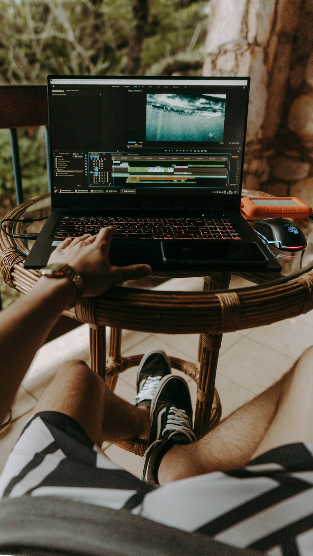 person using black laptop computer