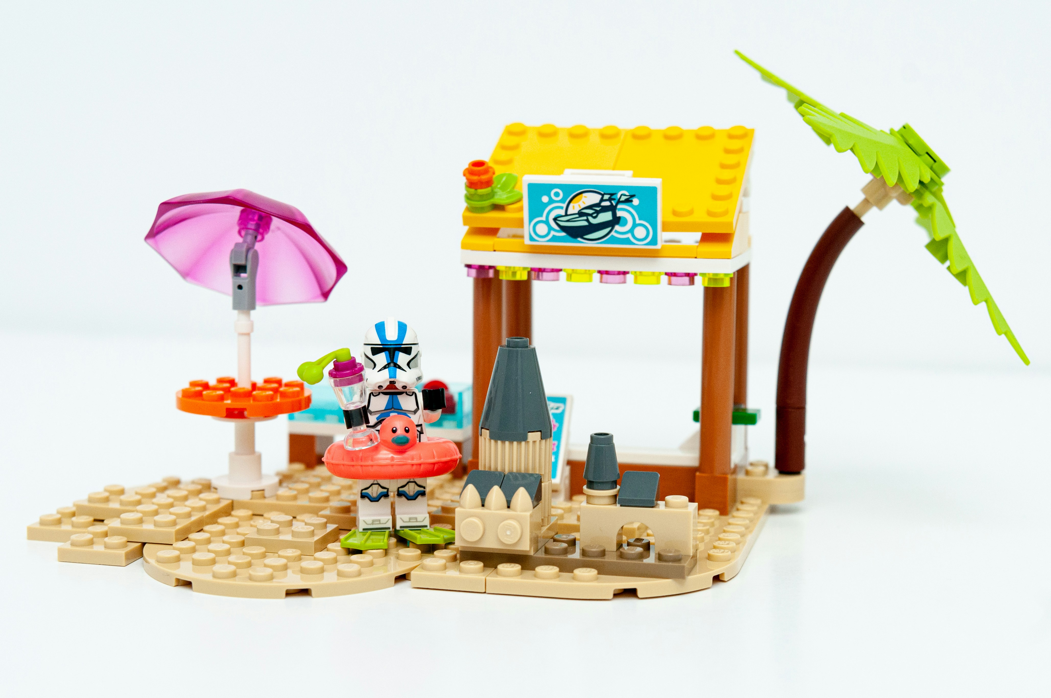 brown wooden house miniature on brown woven table