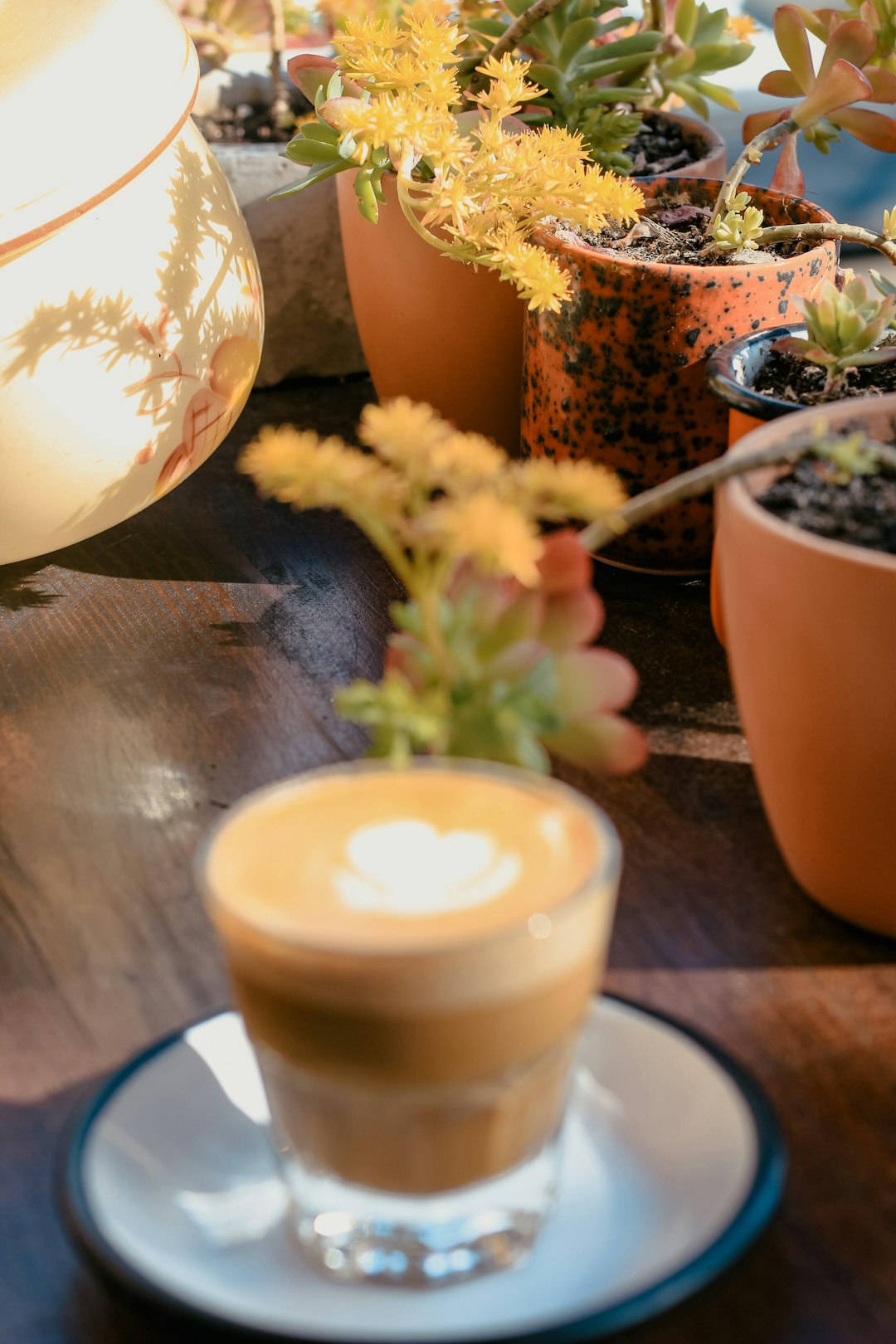 white ceramic cup with white liquid