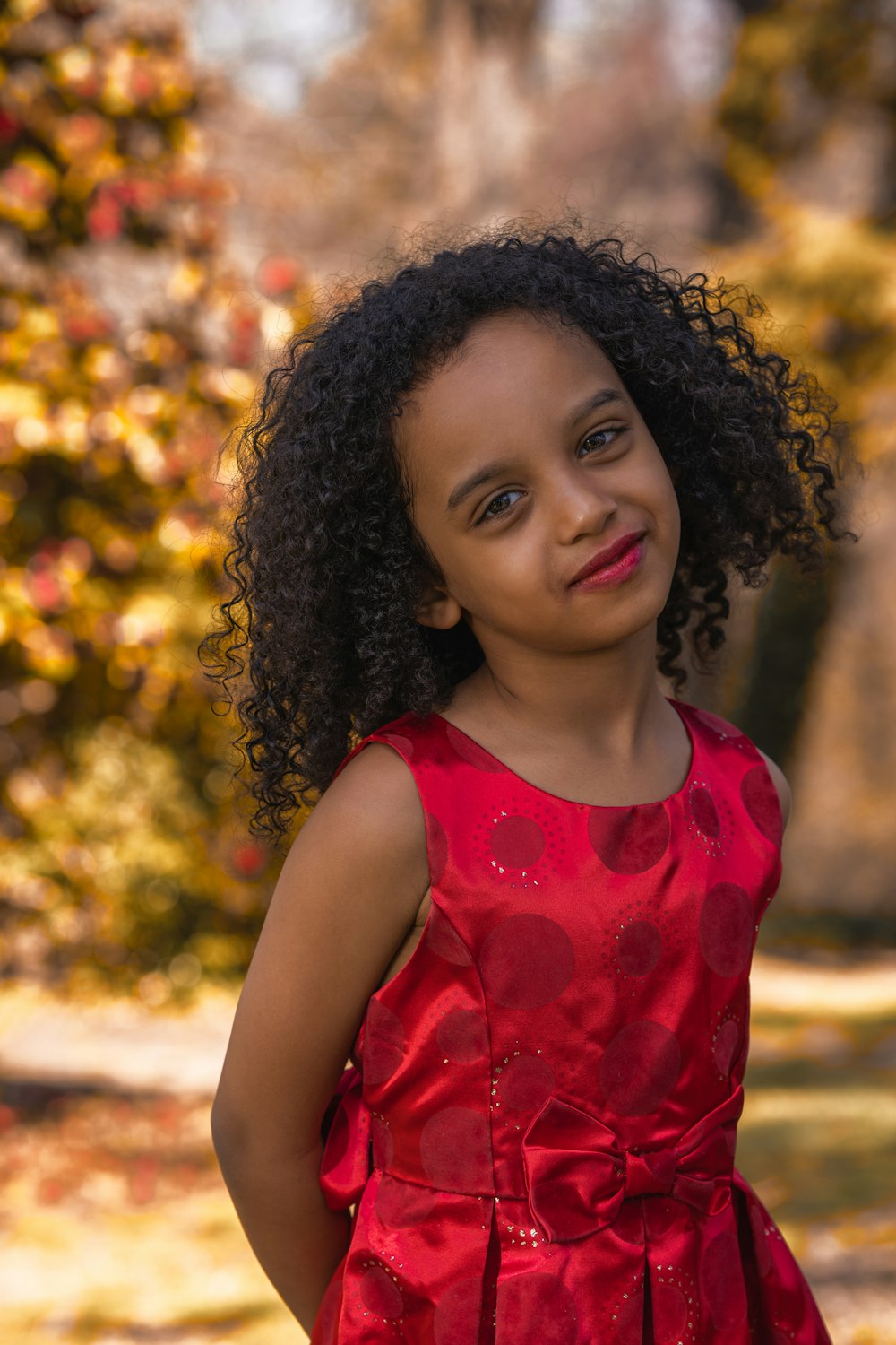 girl in red sleeveless dress