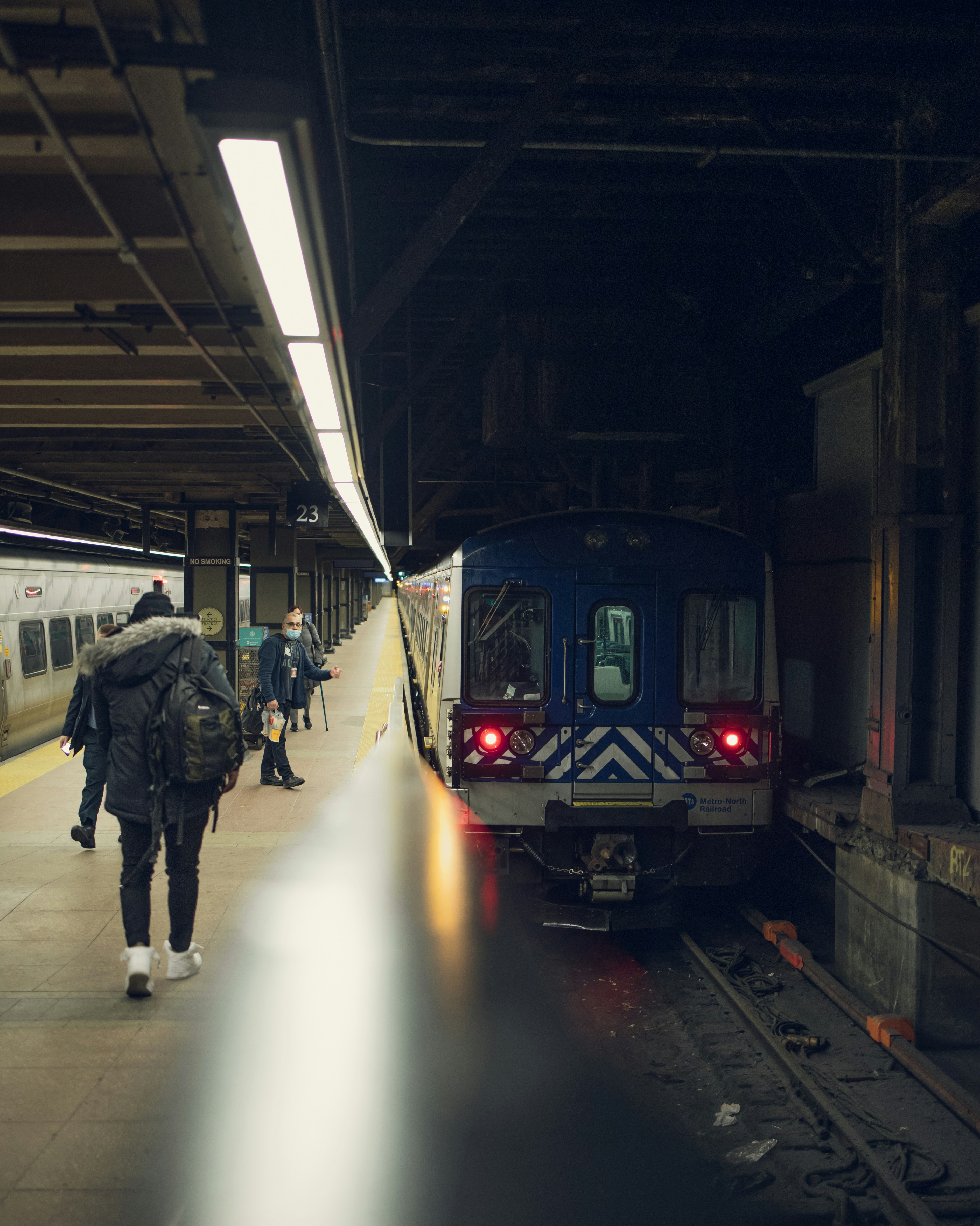 people walking on train station