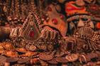 A modern, elegant display of handcrafted Mexican jewelry featuring vibrant colors and textures.