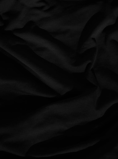 black textile on white textile