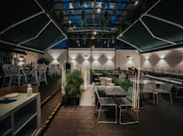 A cozy dining area inside St James featuring local eateries and inviting seating.