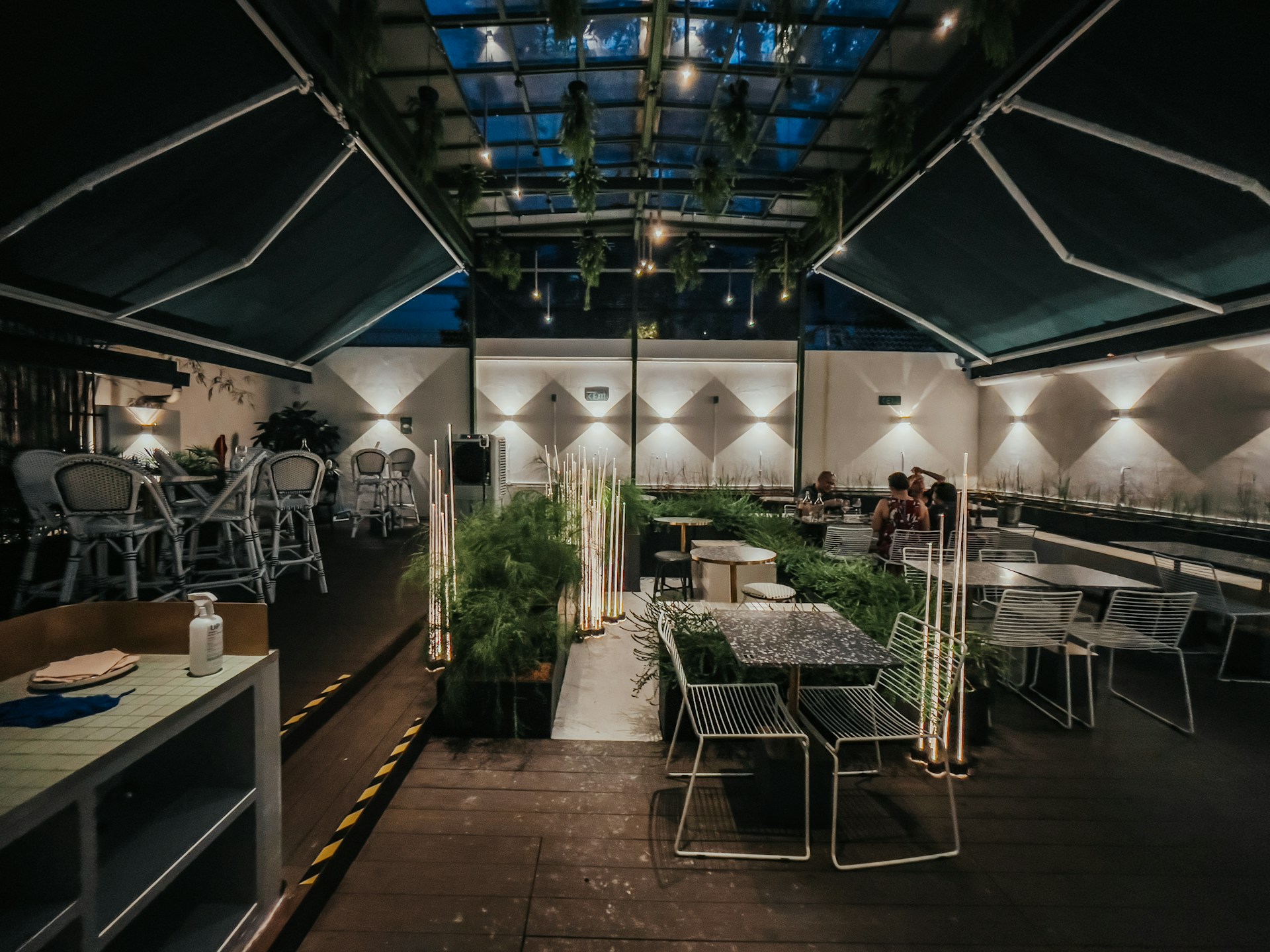 woman wearing yellow long-sleeved dress under white clouds and blue sky during daytime