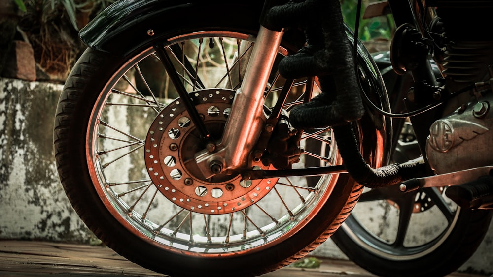 red and silver bicycle wheel