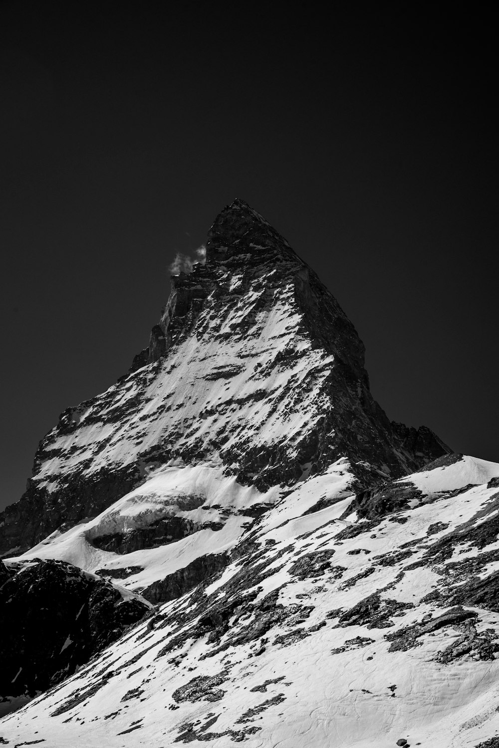 grayscale photo of snow covered mountain