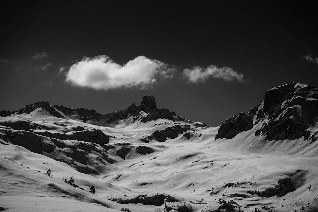 grayscale photo of snow covered mountain