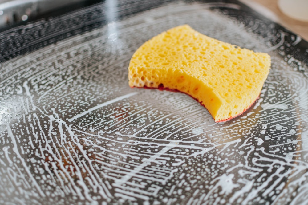 yellow powder on clear glass bowl