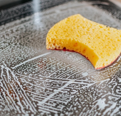 yellow powder on clear glass bowl