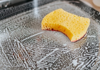 yellow powder on clear glass bowl