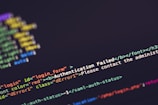 A close-up view of computer code on a screen with a focus on an error message in HTML format. The error message 'Authentication Failed' is highlighted in a bold red font, emphasizing its importance. The screen displays a mix of HTML code syntax, including elements, attributes, and comments.