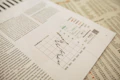 An open research report showing detailed charts and findings.