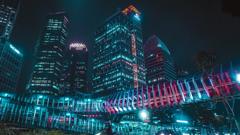 gray high rise building during night time