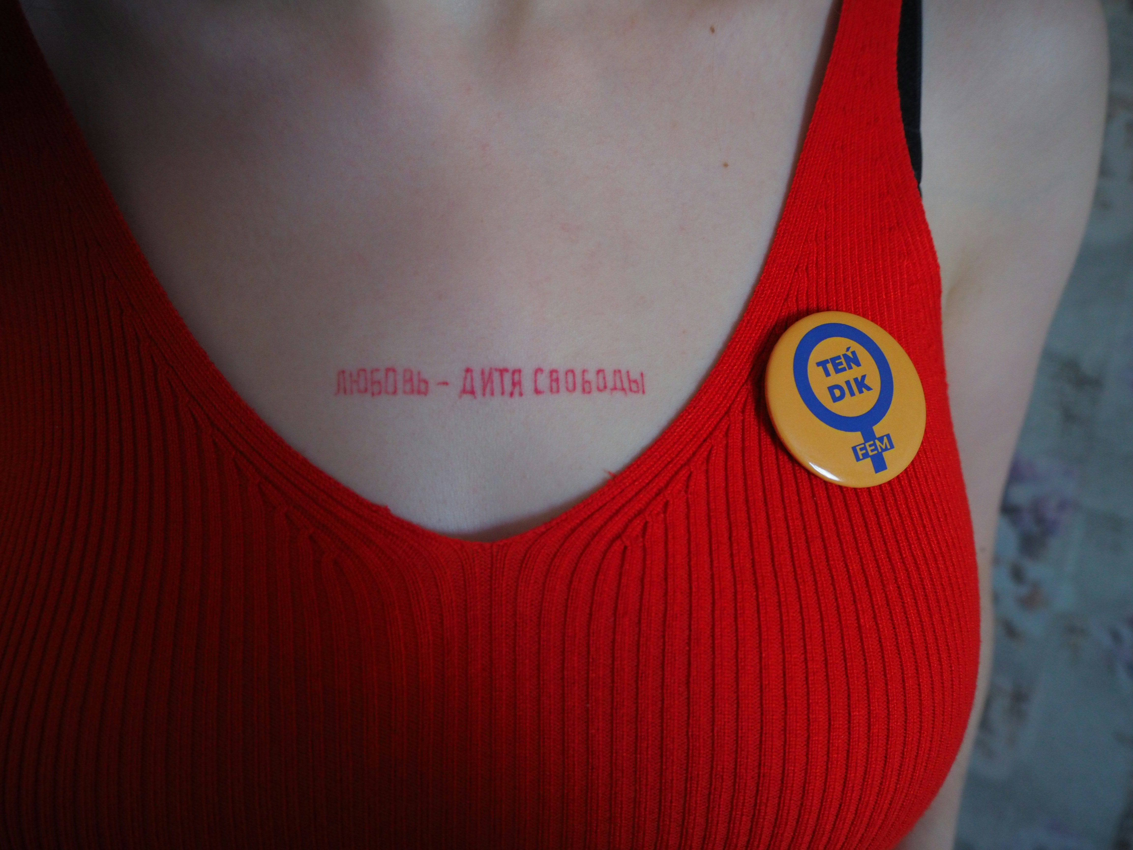 woman in red tank top