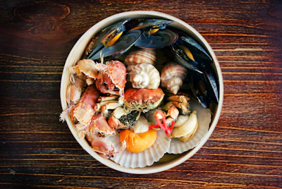 A seafood platter with assorted shellfish arranged on a serving dish