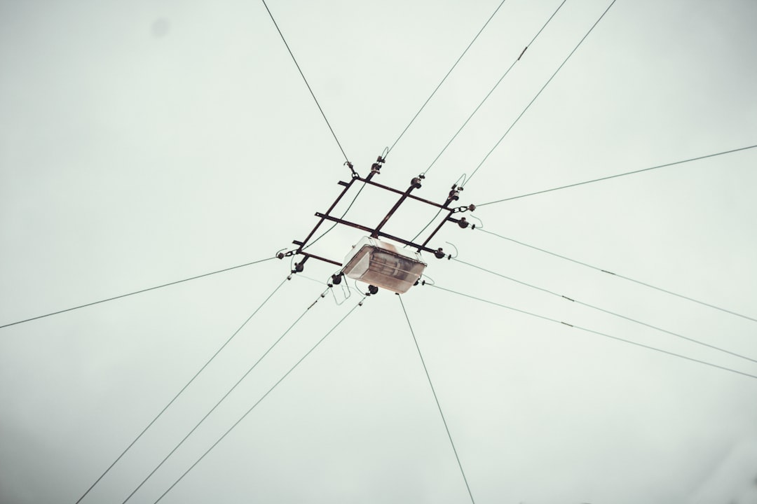 cable car under white clouds