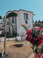 white outdoor fan on brown wooden stand