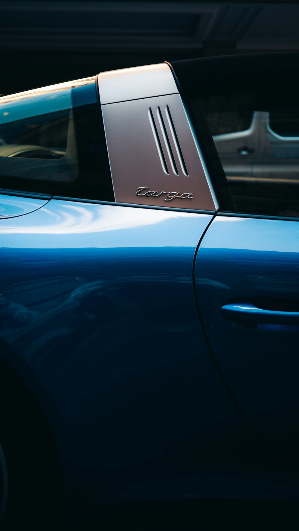 blue car with white license plate