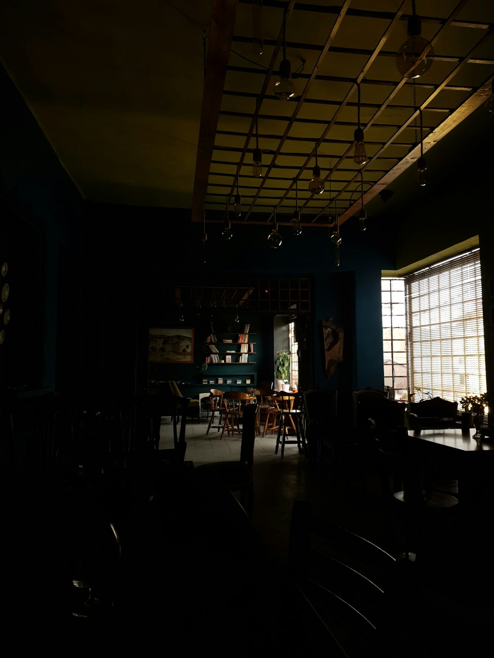 people sitting on chairs inside room