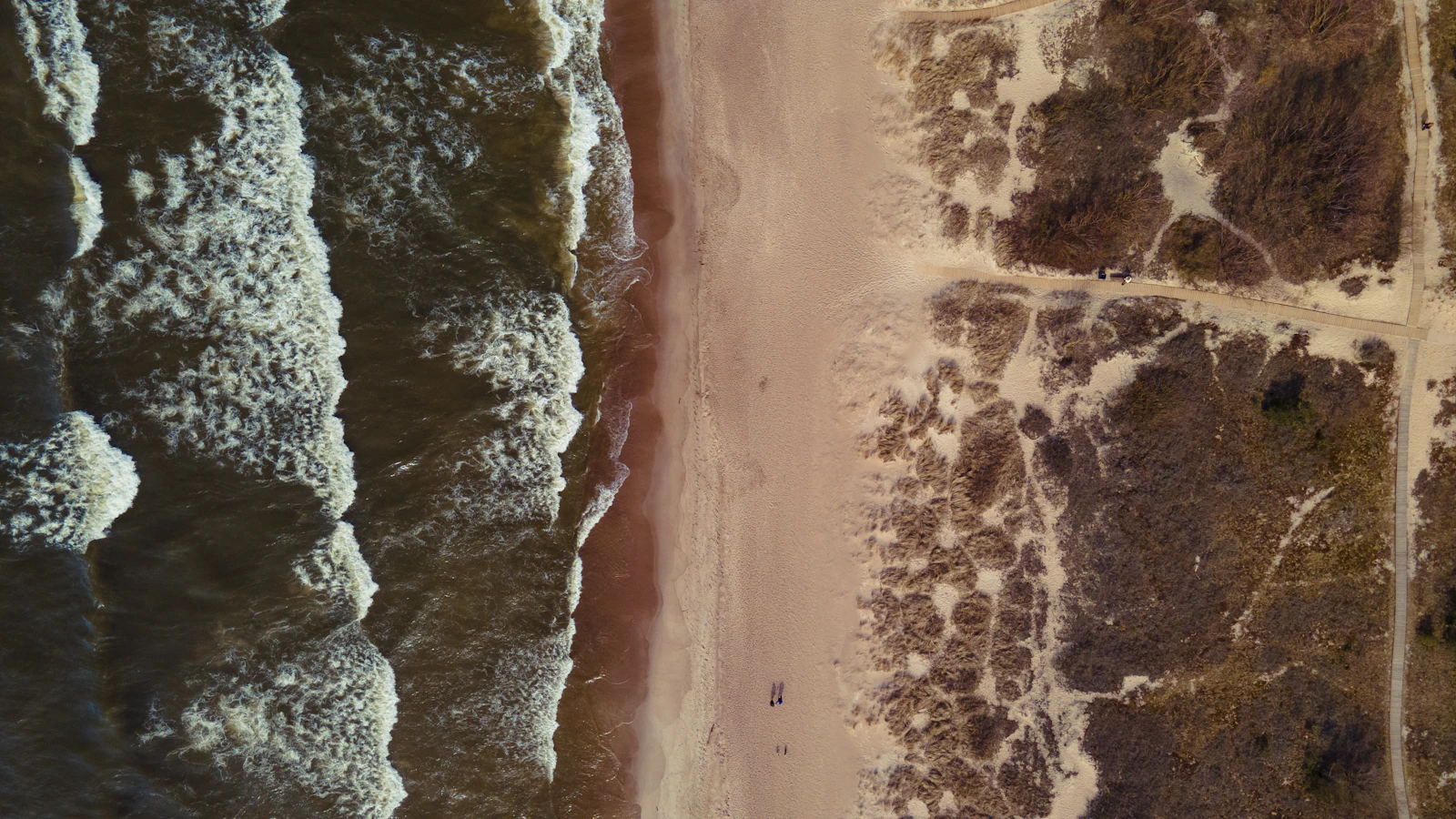 Waves breaking on the Baltic shore near Klaipėda, from above