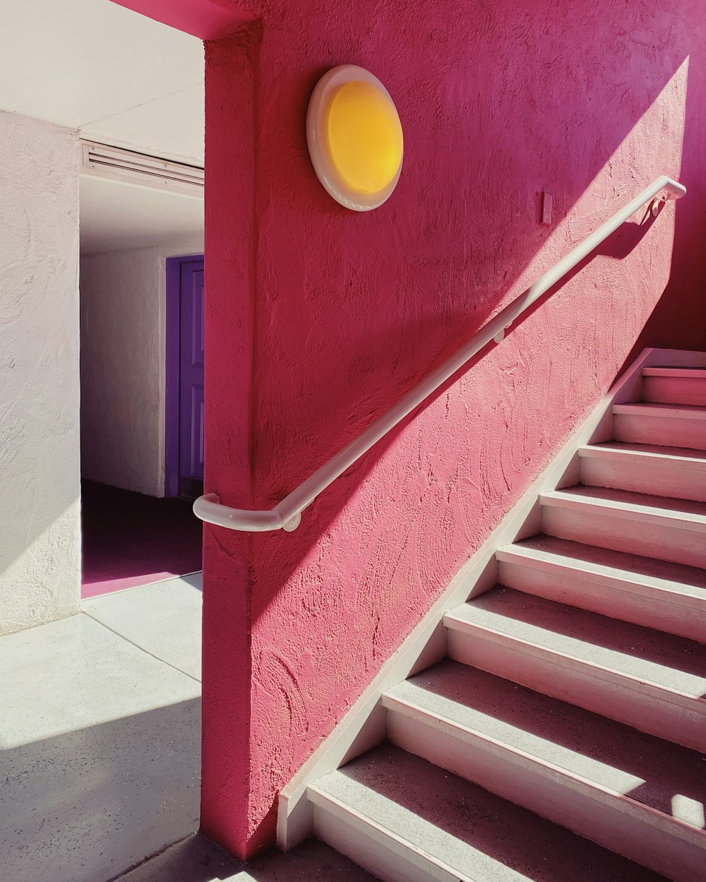 red and blue concrete staircase