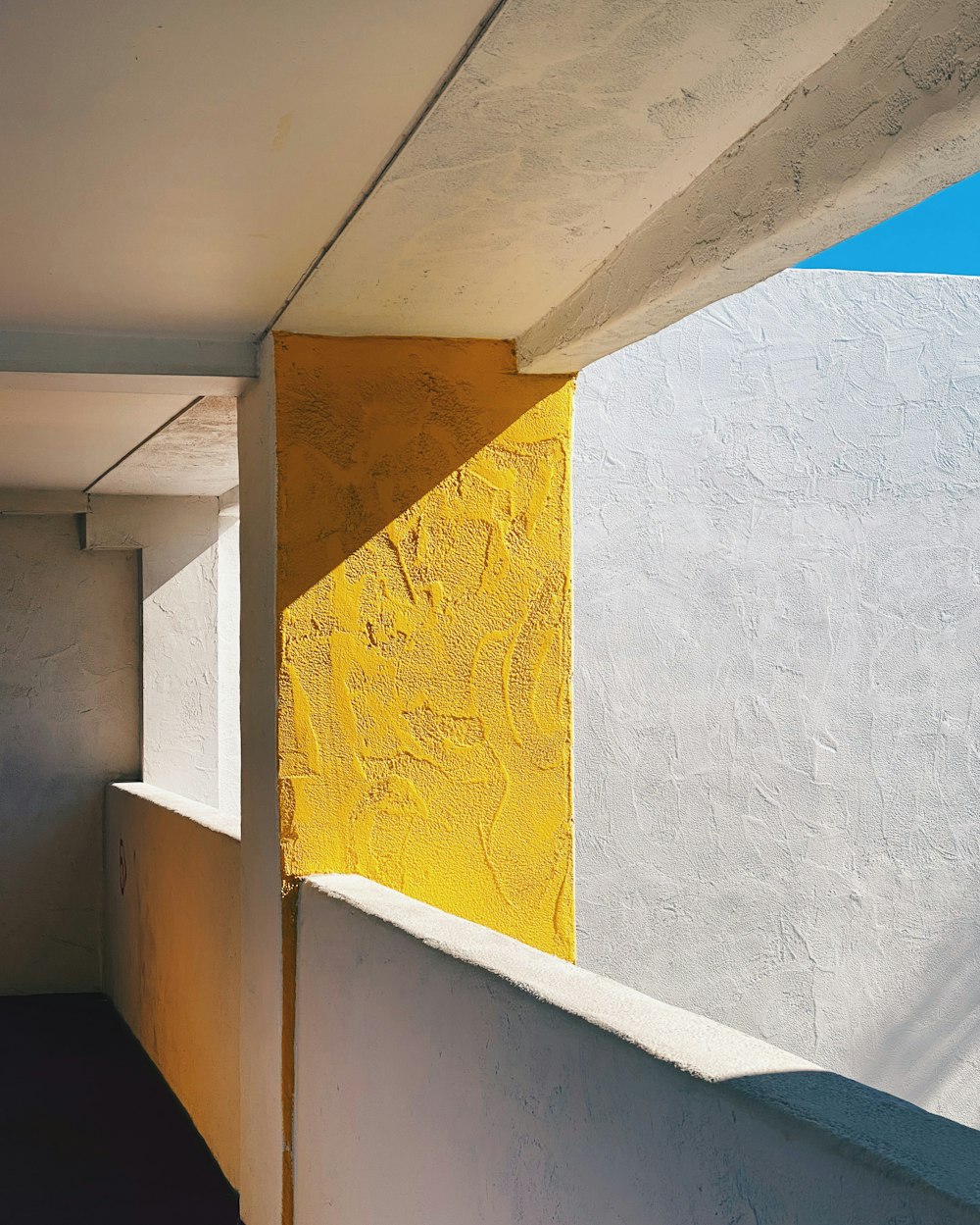 white and yellow concrete wall