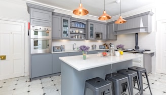 white wooden kitchen cabinet with kitchen sink