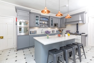 white wooden kitchen cabinet with kitchen sink