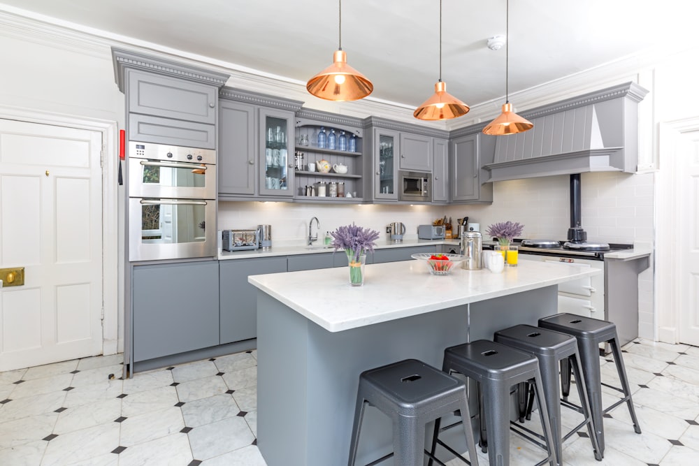 white wooden kitchen cabinet with kitchen sink