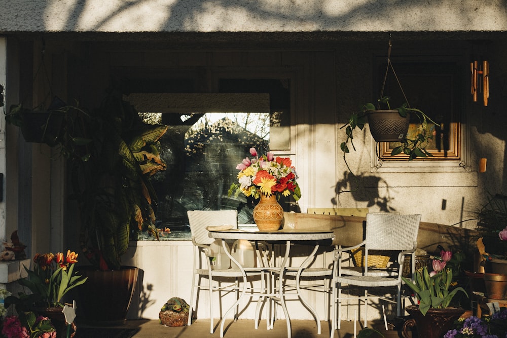 red and yellow flowers on brown wooden table