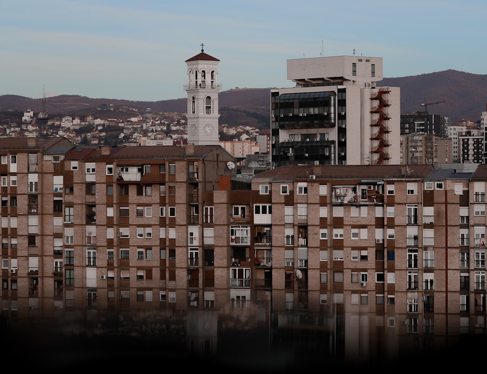 brown and white concrete building during daytime