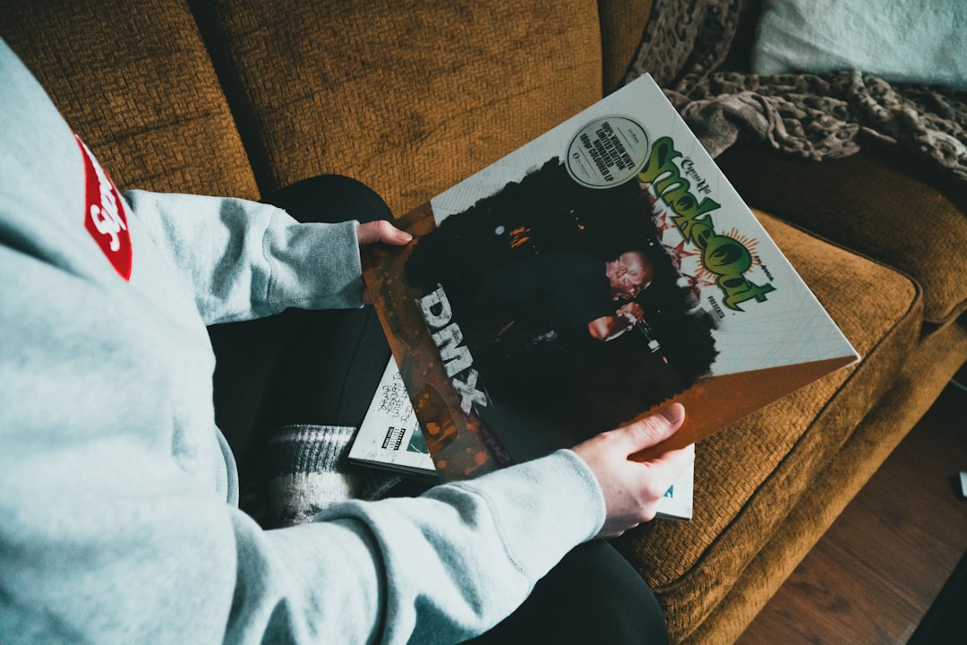 person holding black and white book