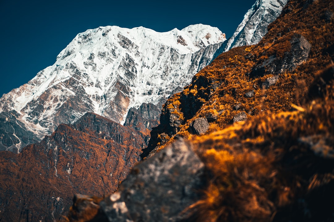 snow covered mountain during daytime