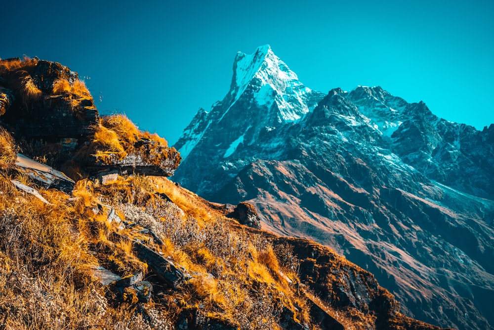 brown and white rocky mountain under blue sky during daytime