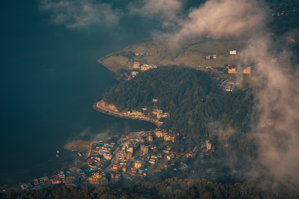 aerial view of city buildings near mountain during night time