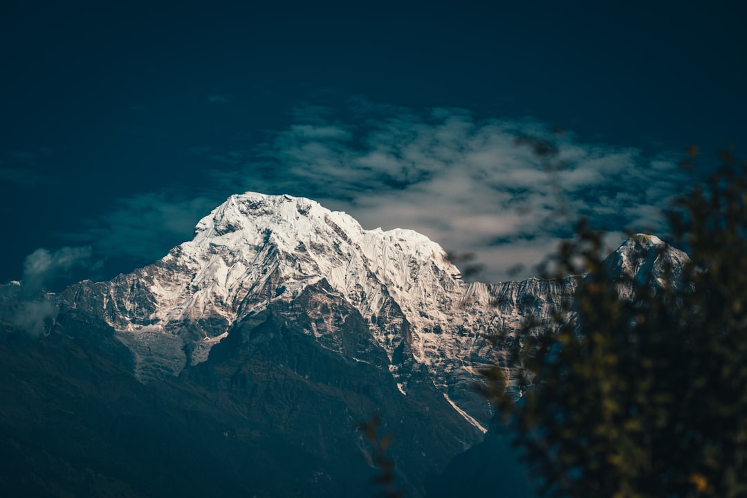 snow covered mountain under blue sky during daytime