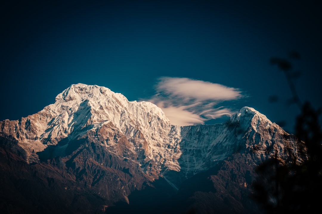 snow covered mountain under blue sky during daytime