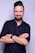man in black dress shirt wearing black apple watch