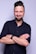 man in black dress shirt wearing black apple watch