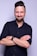 man in black dress shirt wearing black apple watch