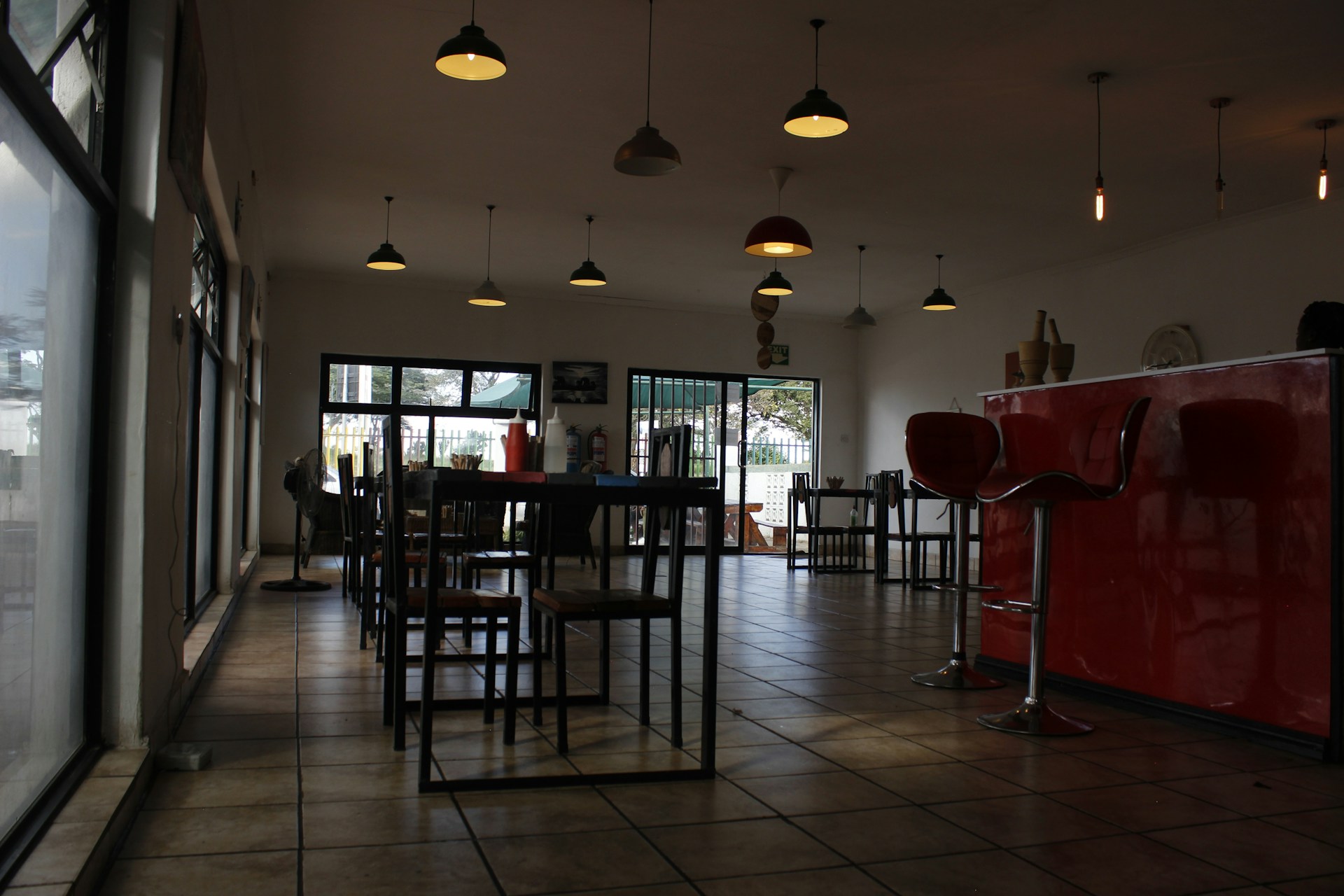 woman wearing yellow long-sleeved dress under white clouds and blue sky during daytime