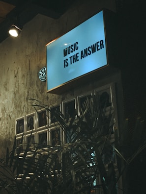 blue and white wooden signage