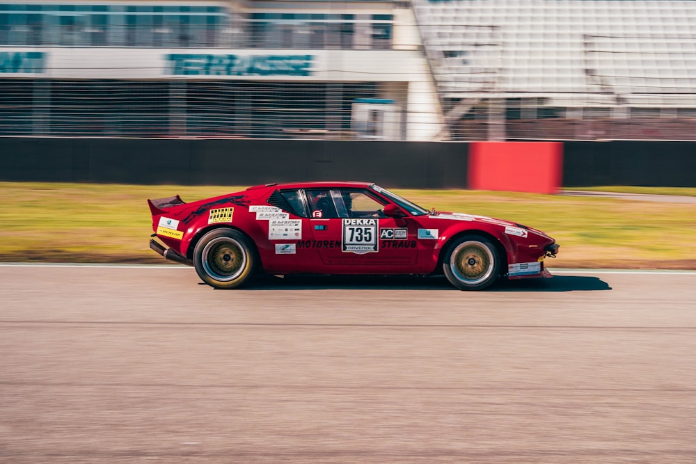 red porsche 911 on track field