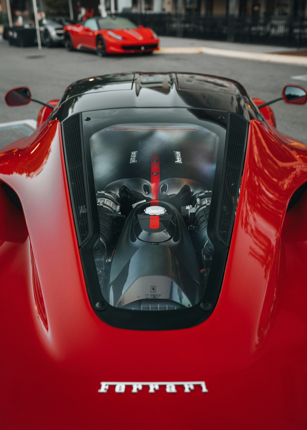 red ferrari 458 italia on road