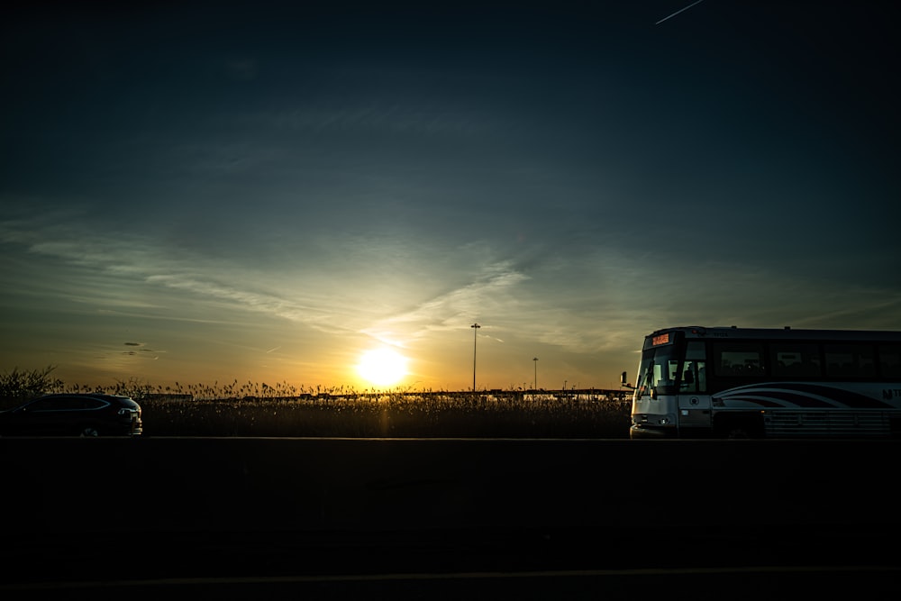 silhouette of bus during sunset